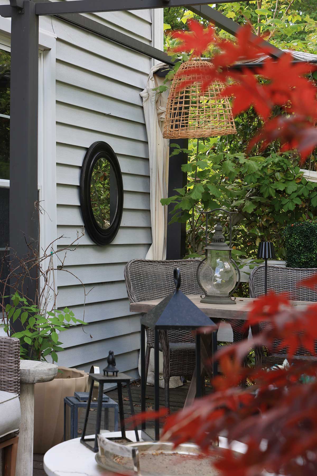 Mirror hanging on a wall on a deck