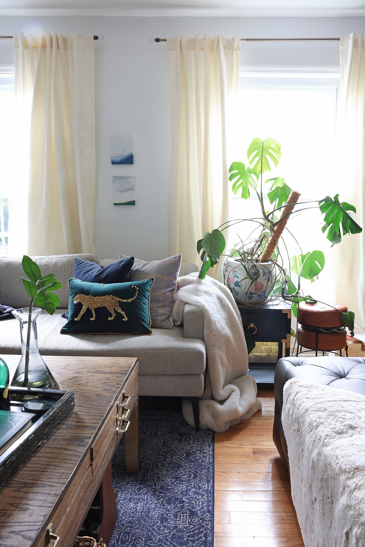 Blankets and throws draped over living room furniture