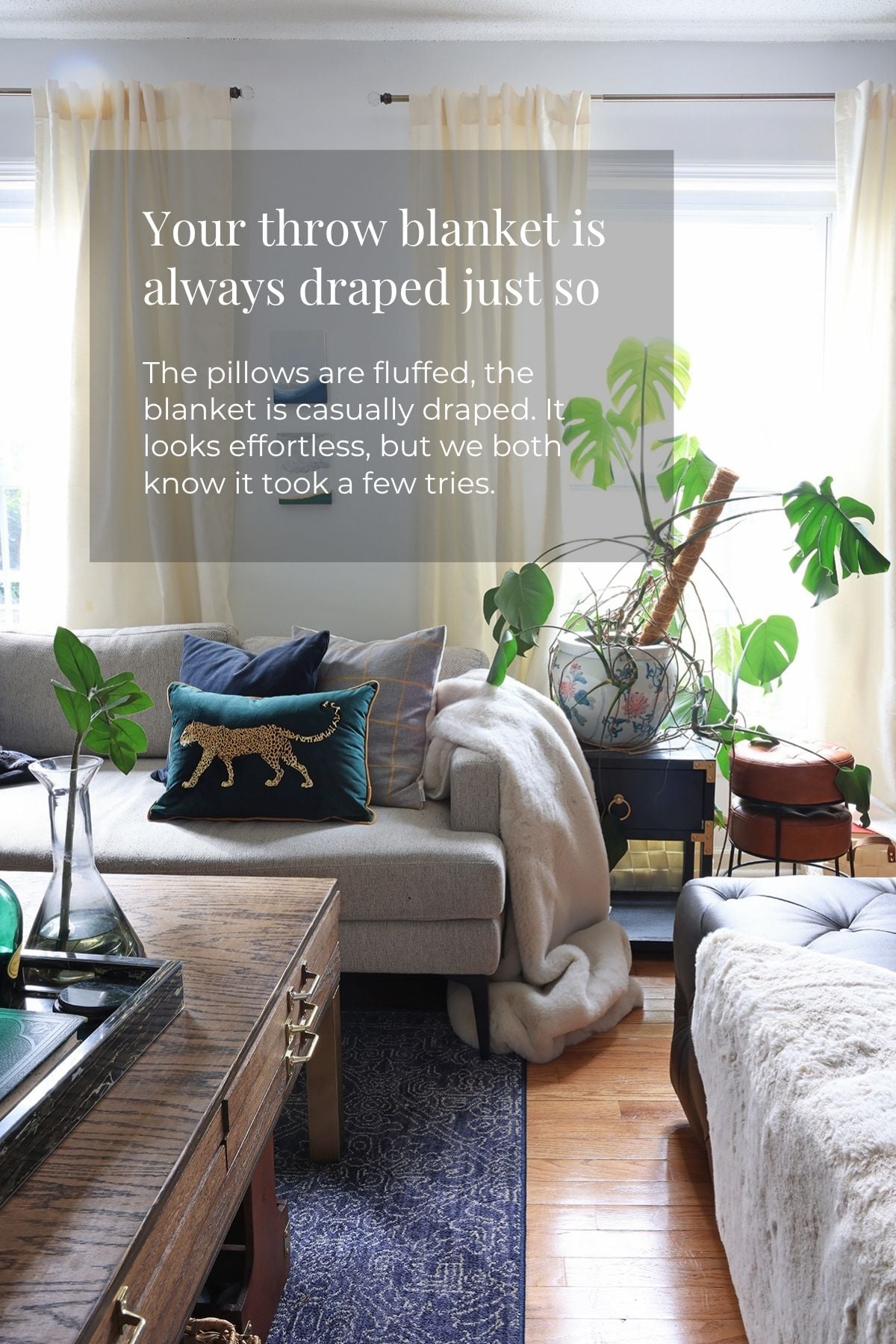 Living room with soft draped throw on the arm.
