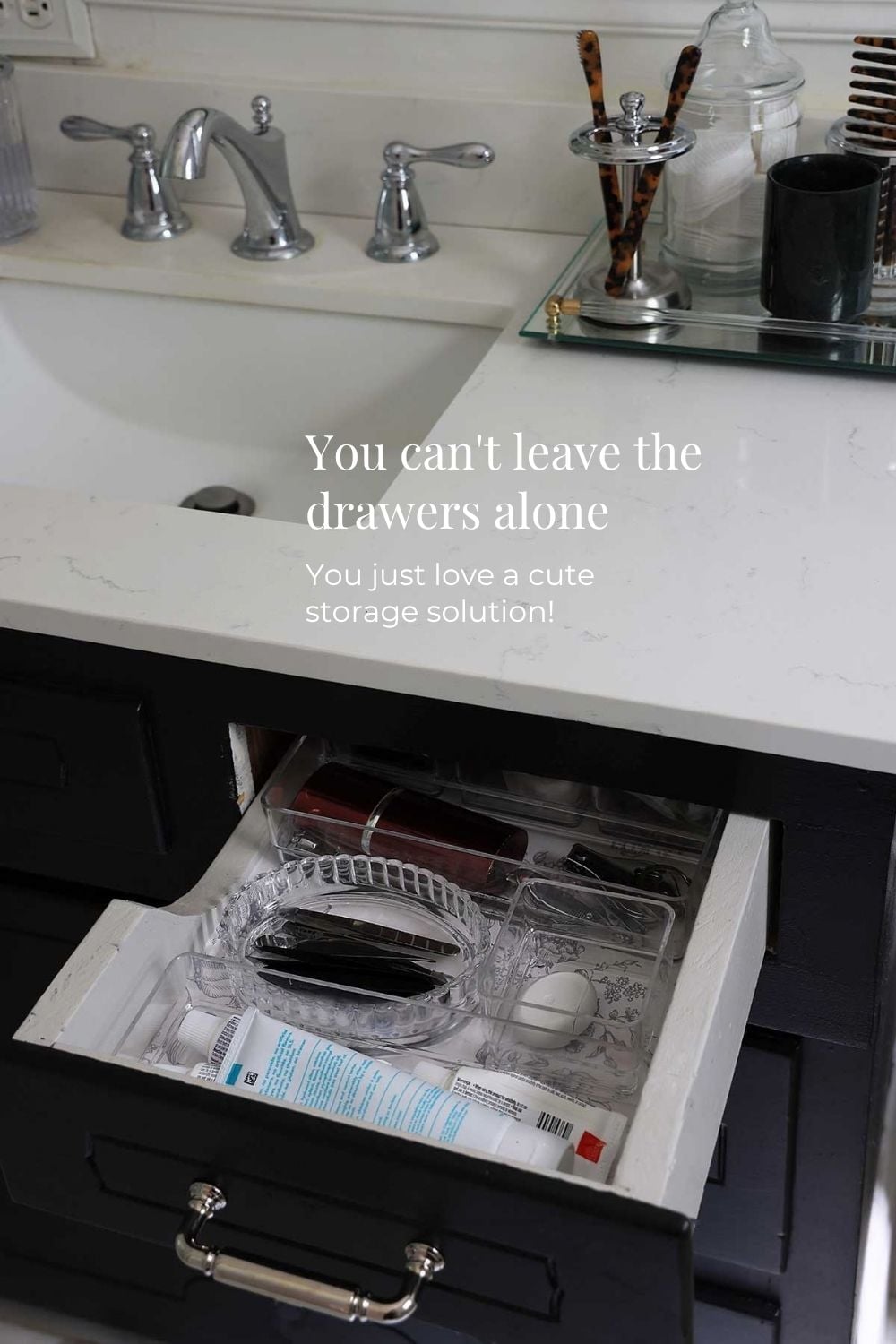 Drawer with clear organizers and pretty floral contact paper.